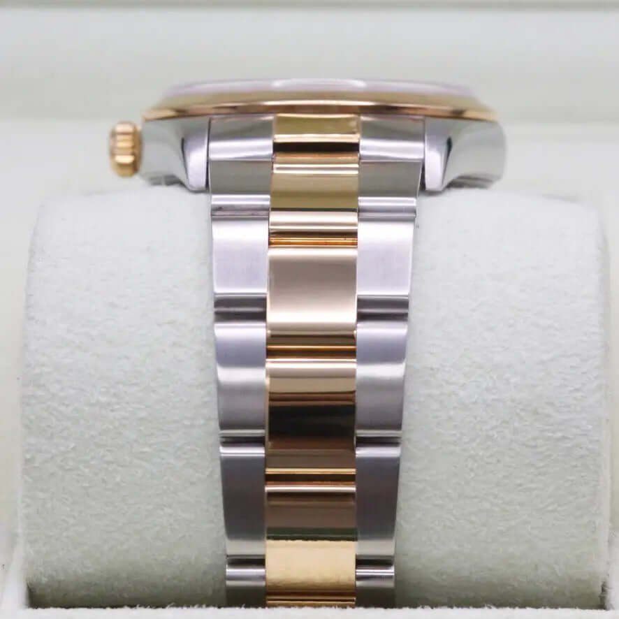 Rolex Oyster Perpetual 34 Champagne Dial 14203M Year: 2001 Rolex Oyster Perpetual 34 Champagne Dial 14203M Year: 2001
